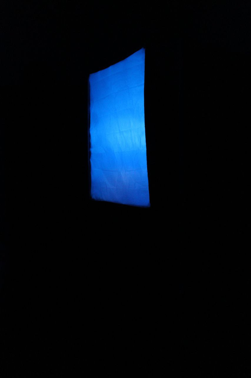 Picture of a bright blue rectangle against a dark background